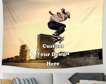 May include: A tapestry featuring a person skateboarding in front of a city skyline. The text "Custom Your Design Here" is printed on the tapestry.
