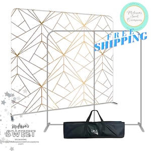 May include: A white backdrop with a geometric pattern of gold lines. The backdrop is set up on a stand with a black carrying case. The text "FREE SHIPPING" is printed in blue on a white background.