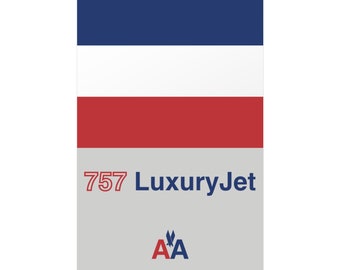 May include: A rectangular design with blue, white, and red horizontal stripes at the top. Below the stripes is a gray section with the text "757 LuxuryJet" and the American Airlines logo.