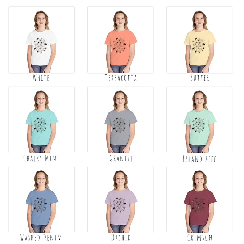 May include: Nine different colour t-shirts with a black and white graphic design of a mandala with a floral pattern. The colours are white, terracotta, butter, chalky mint, granite, island reef, washed denim, orchid, and crimson.