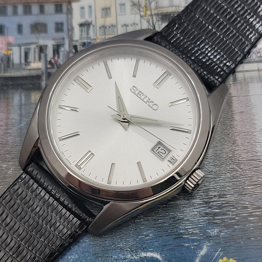 SEIKO セイコー SUR307 Men's Seiko Watch, White Dial, Black Leather Strap - Model SUR307