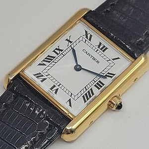 Authentic Unisex Cartier Tank Quartz Watch: White Dial, Chic Design
