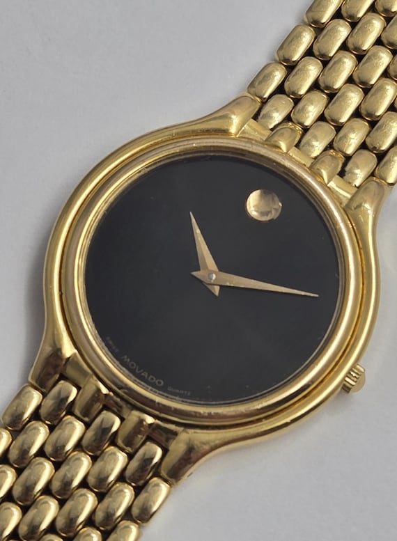 Movado Gold-tone 32mm Unisex Watch: Swiss Quartz, Black Dial 