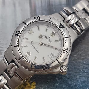 Ladies Movado with date Indicator 91.E1.831 Fits 6.25" 28mm Runs Perfect & Chic