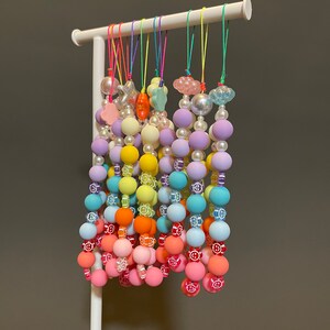 rainbow phonechain！star、bowknot、Matt beads、Shell color 。High-end   Little pearl  handmade chain… Original design…