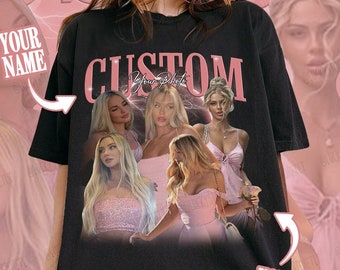 May include: Black t-shirt with a pink "CUSTOM" graphic featuring a collage of women in pink clothing. The text "Your Photo" is in a pink box on the bottom right corner of the shirt.