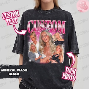 May include: A black mineral wash t-shirt with a pink graphic that says "CUSTOM" and features a collage of photos. The text "YOUR PHOTO" is also included on the shirt.