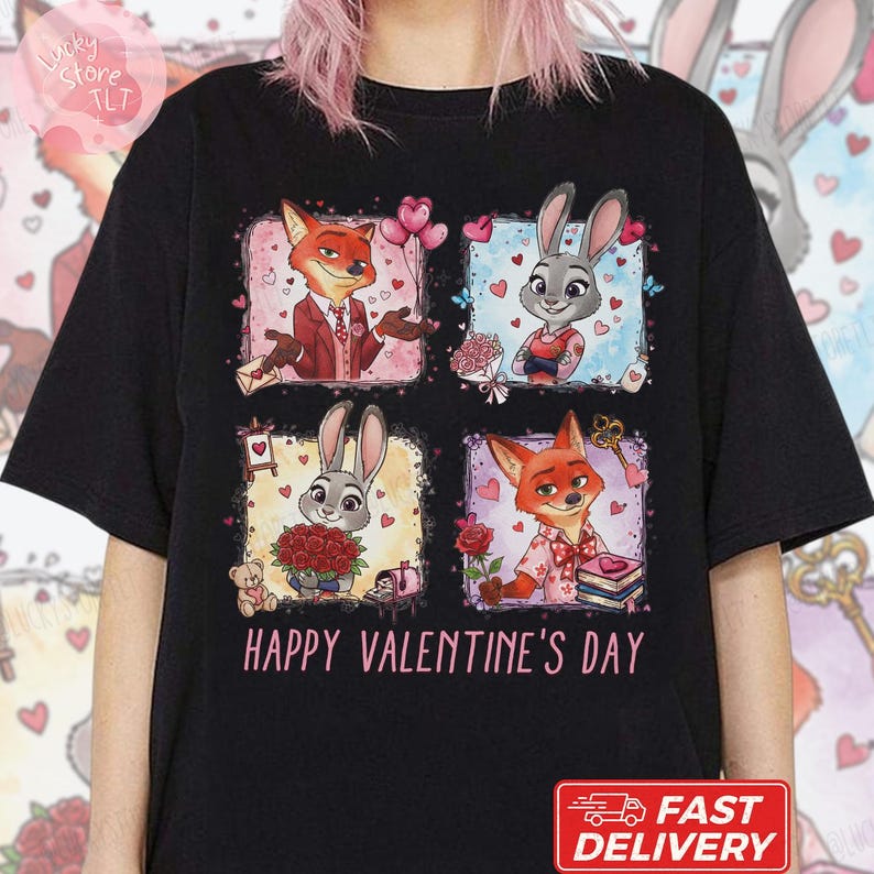 Pu&ograve; includere: T-shirt nero con un design di San Valentino. Il design presenta personaggi dei cartoni animati di una volpe e un coniglio in varie pose, circondati da cuori e fiori. Il testo "HAPPY VALENTINE'S DAY" &egrave; stampato sotto.