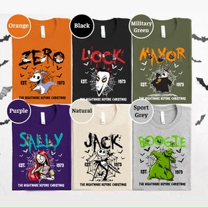 May include: A collection of six t-shirts in various colors, each featuring a graphic from "The Nightmare Before Christmas." The shirts display characters like Zero, Lock, Mayor, Sally, Jack, and Oogie Boogie, with the text "EST. 1973" and the film's title.