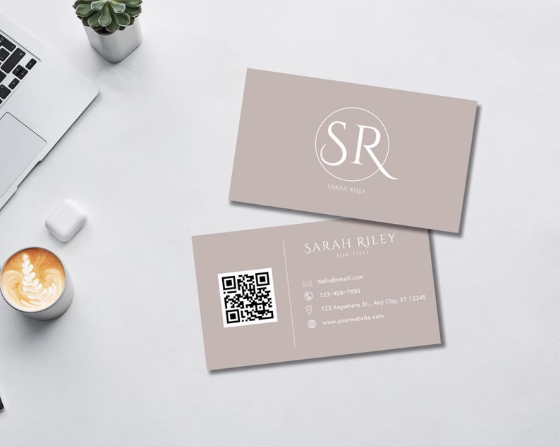 May include: A light brown business card with a white circle containing the letters "SR" and the text "SARAH RILEY" below. The card also includes a QR code, contact information, and the text "SARAH RILEY Skin Care".