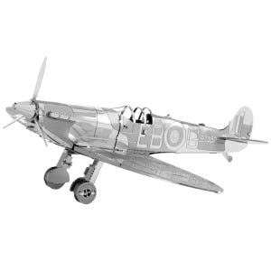 May include: A silver metal model aeroplane with a propeller, wings, and tail. The model has intricate details, including the cockpit and landing gear. The text "EB" and "P7350" are visible on the side of the plane. The model is a detailed replica.
