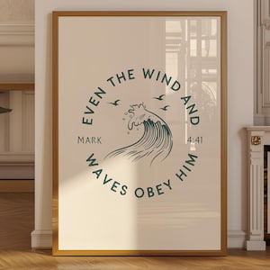May include: A framed print with a gold-coloured frame. The artwork features a teal wave design with the text "Even the wind and waves obey him" in a circular arrangement. The text also includes "Mark 4:41".