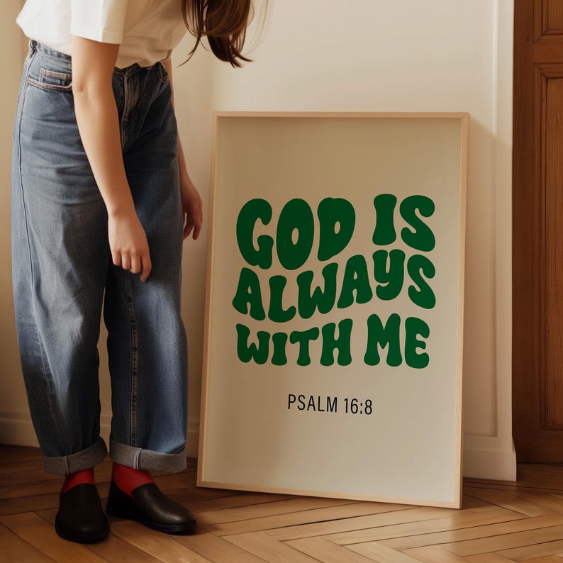May include: A framed print with the text "GOD IS ALWAYS WITH ME" in green letters on a white background. The text "PSALM 16:8" is printed below the main text.