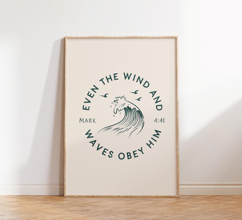 May include: A framed print with a beige background and a circular design in teal. The design features a stylized wave, three birds, and the text "Even the wind and waves obey Him" with "Mark 4:41". The frame is a light brown color.