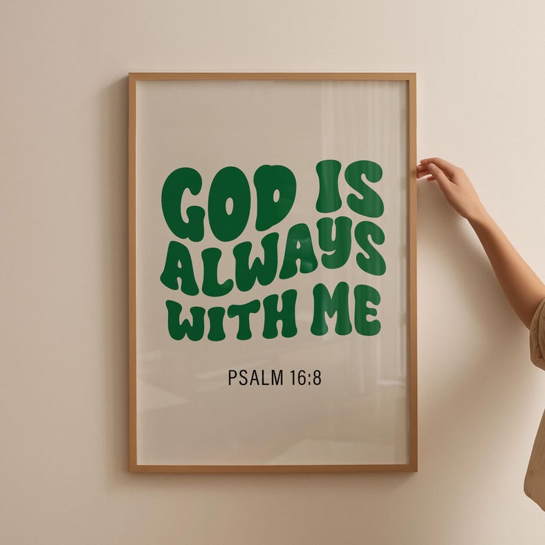 May include: A framed print with a white background and green text that reads "GOD IS ALWAYS WITH ME" and "PSALM 16:8".