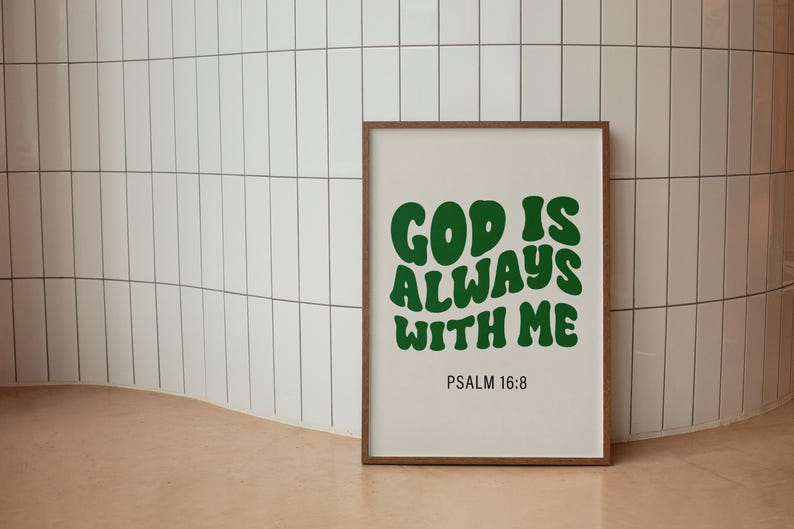 May include: A framed print with a white background and a green text overlay that reads "GOD IS ALWAYS WITH ME" and "PSALM 16:8".