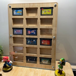 Nintendo Gameboy Advance - Soporte de pared - Marco 18 juegos - Plexiglás - Colección Display