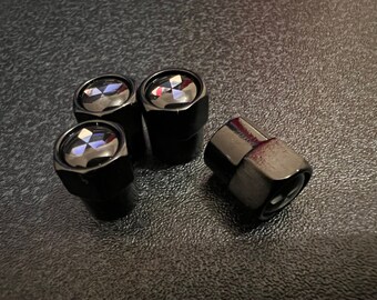 Shiny Black Mitsubishi Dust Valve Caps - (Set of 4)