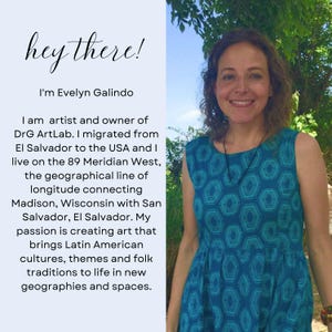 May include: A woman with short brown hair smiles at the camera. She is wearing a teal blue dress with a geometric pattern. The text "hey there! I'm Evelyn Galindo" is at the top of the image. The text below the woman's image describes her as an artist and owner of DrG ArtLab. She migrated from El Salvador to the USA and lives on the 89th Meridian West, the geographical line of longitude connecting Madison, Wisconsin with San Salvador, El Salvador. Her passion is creating art that brings Latin American cultures, themes and folk traditions to life in new geographies and spaces.