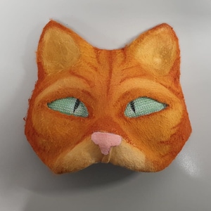 orange tabby cat therian mask in 2023  Cat mask, Orange tabby cats, Dog  mask