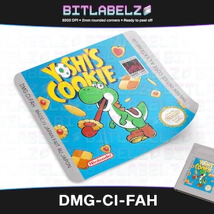 Könnte beinhalten: Ein blaues und weißes Game Boy-Cartridge-Etikett mit dem Text "Yoshi's Cookie" und einem grünen Yoshi-Charakter. Das Etikett ist für die DMG-CI-FAH-Spielkassette und wurde in Japan hergestellt.