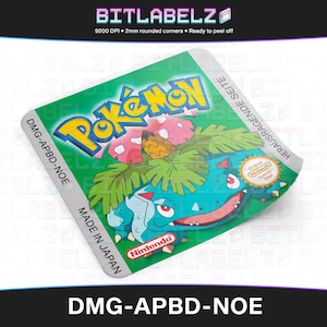May include: Green and white Nintendo Game Boy cartridge label featuring the text "Pokémon" and an image of a blue and green Pokémon character. The label also includes the text "DMG-APBD-NOE" and "MADE IN JAPAN".