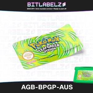 以下が含まれることがあります： 「ポケモンリーフグリーンバージョン」と「AGB-BPGP-AUS」の文字が書かれた緑と黄色のゲームボーイアドバンスゲームカートリッジ。カートリッジは渦巻き模様で、任天堂の品質保証シールが付いています。