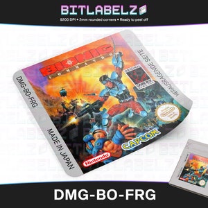 Könnte beinhalten: Ein Retro-Videospiel-Kartuschenlabel für das Spiel "Sonic Commando" für den Game Boy. Das Etikett ist weiß mit blauem, rotem und schwarzem Text und Grafiken. Das Etikett ist mit dem Text "DMG-BO-FRG" und "MADE IN JAPAN" bedruckt.