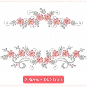 May include: A floral embroidery design with two rows of pink flowers and silver leaves. The design is available in two sizes: 18 cm and 21 cm.