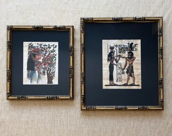 Vintage Egyptian papyrus paintings with faux bamboo frames