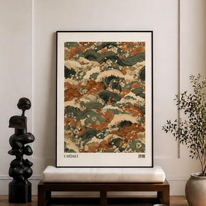 May include: Framed art print featuring a Japanese wave pattern in shades of green, rust, and white. The print is displayed on a white bench with a dark wooden frame. The print has the word "CHOSEI" and Japanese characters.