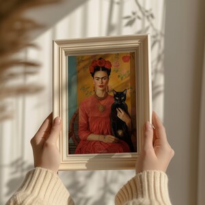 frida kahlo portrait with black cat