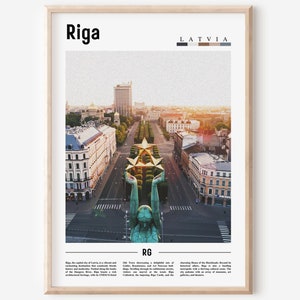 May include: A framed print featuring a cityscape of Riga, Latvia, with the city name in bold black letters at the top. The image showcases a wide avenue lined with buildings and a monument with golden stars. The sky is a warm, golden color.