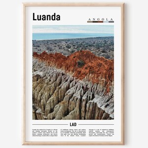 May include: A poster with a photograph of a rocky landscape in Luanda, Angola. The poster has the text "Luanda" and "Angola" in a bold, sans-serif font. The text "Luanda" is larger than the text "Angola". The poster also includes a color palette of brown, beige, and gray.