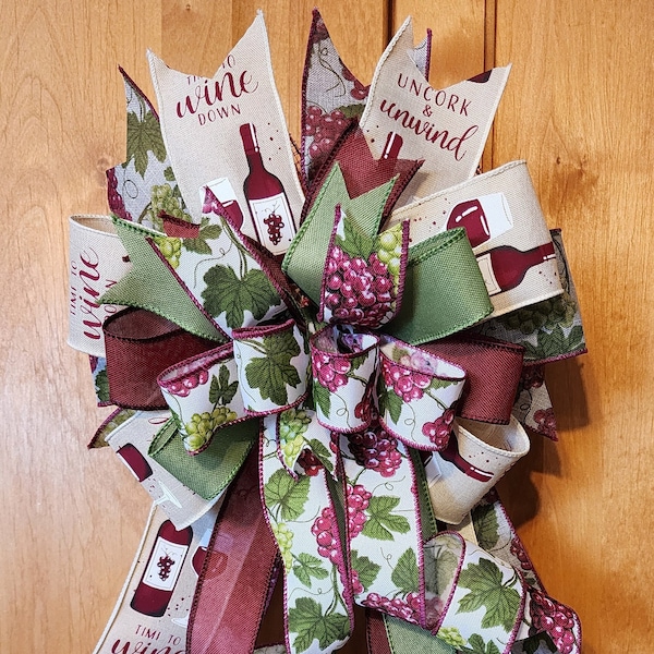 Wine bow with Uncork & Unwind wine bottle, glass and grapevine ribbons. Bow for lantern, mailbox, banister, staircase, sconces. Wreath bow.