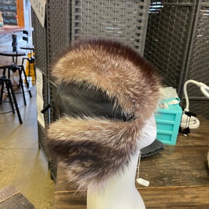 Raccoon fur trapper hat