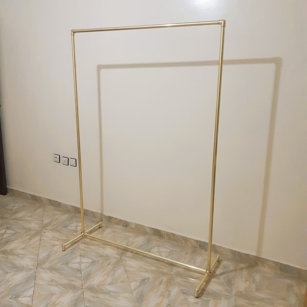 Handmade Brass Rolling Clothes Rack: Garment Storage with Wheels
