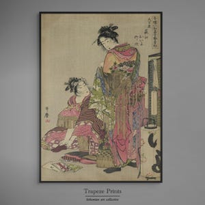 May include: A vintage Japanese woodblock print depicting two women in traditional clothing. The woman in the foreground is seated and holding a fan, while the woman in the background is standing and looking at the viewer. The print is in shades of pink, green, and brown.