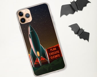 Könnte beinhalten: Transparente Handyhülle mit einem Retro-Raketendesign vor einem sternenklaren Nachthimmel. Auf der Hülle steht in Rot "PLAN EXECUTE ELEVATE". Zwei schwarze Papierfledermäuse liegen neben dem Telefon.