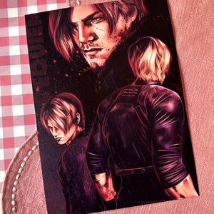 May include: A dark, artistic print featuring three figures with a red and black color scheme. The top figure is a close-up of a man's face, while the other two figures are shown from the shoulders up. The print has a dramatic, action-oriented theme.