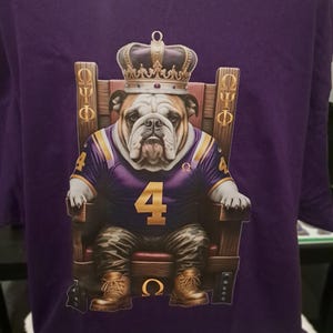Omega Psi Phi,  Que Dawg, number 4, Tee shirt, 39 dollars , shipping included Size 3x or 2x. Purple