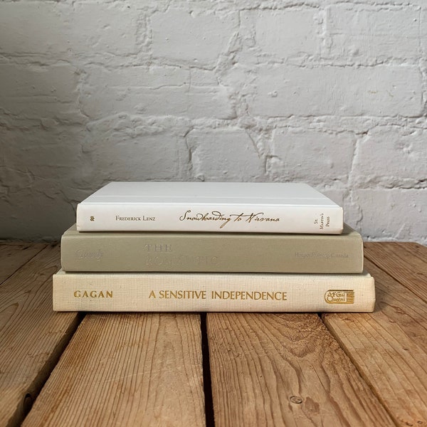 Taupe book stack, white, light gray, beige, ivory book decor, grey decorative staging prop books, neutral books by colour, stacked books