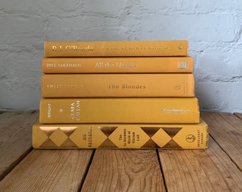 Yellow staging books, mustard book decor, yellow home decor, shelf decor items, prop staging and styling books, luxury coffee table books