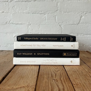 White black and gold decorative books, white coffee table books, black and white bookshelf decor, luxury home decor items, prop staging book