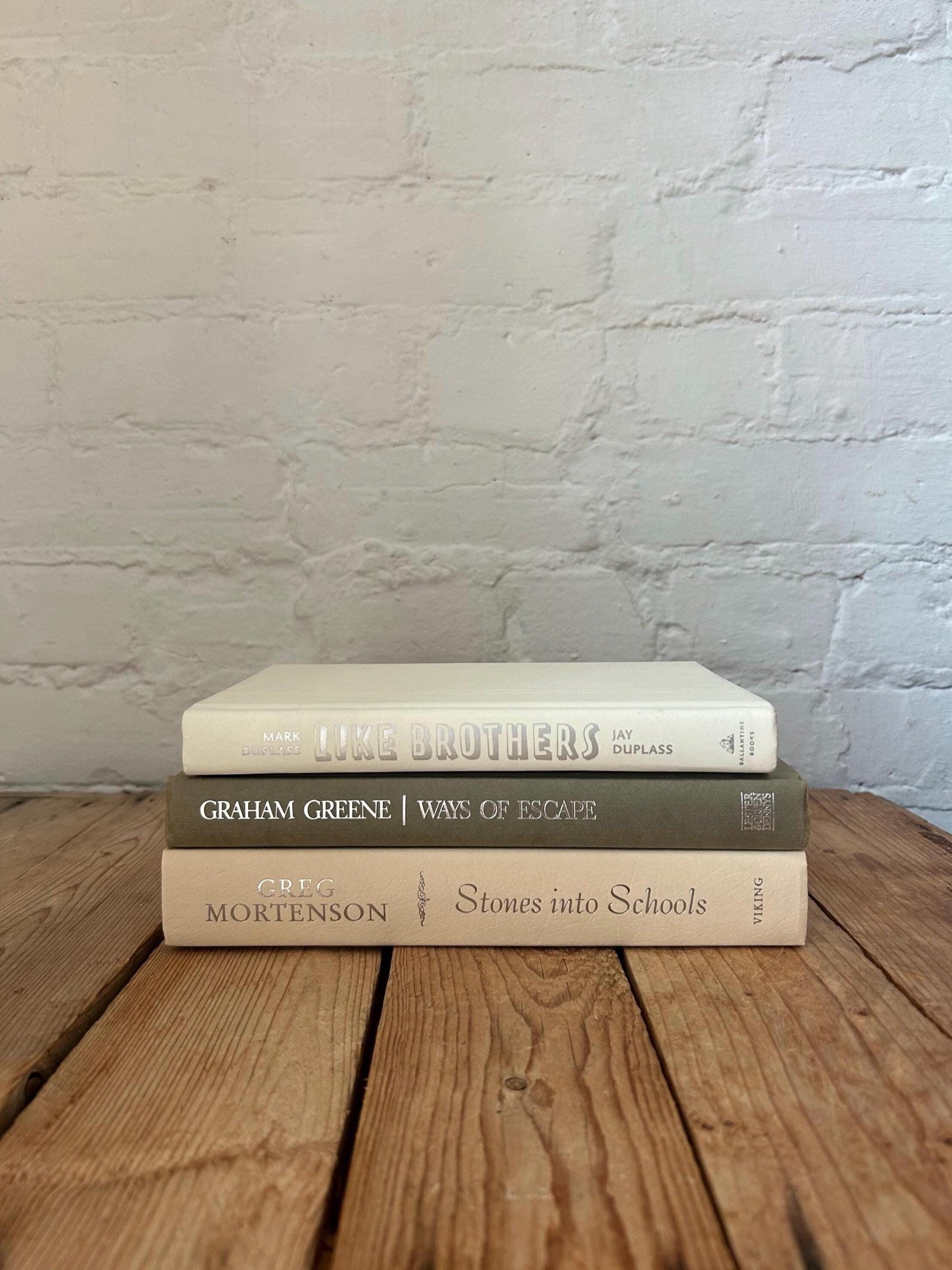 Neutral book stack, luxury staging bo...
