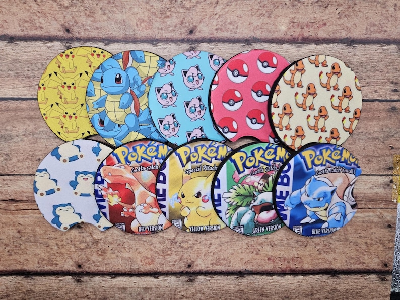 May include: Set of 10 round, colorful, printed beverage coasters featuring Pokemon characters and logos. The coasters are made of a durable material and are perfect for protecting your furniture from spills and scratches.