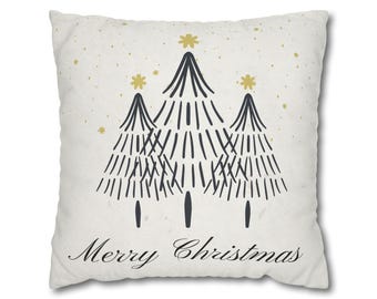 May include: A white throw pillow with a gold and black design of three stylized Christmas trees and the text "Merry Christmas".