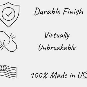 May include: Image with text and line drawings. The text reads "Durable Finish", "Virtually Unbreakable", and "100% Made in USA". The image also includes a shield with a checkmark, two linked chain links, and a US flag.