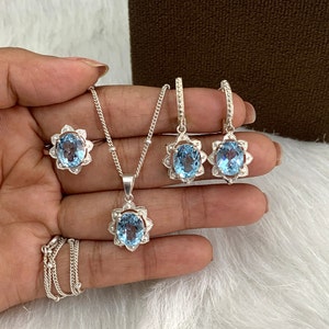 Blue Topaz Sterling Silver Jewelry Set: Floral Pendant, December Birthstone