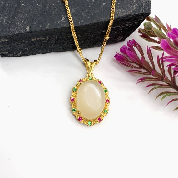 Sterling Silver CZ Framed Oval White Moonstone 18 Sterling Silver CZ Framed Oval White Moonstone 18